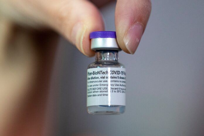 Pfizer-BioNTech COVID-19 vaccine is administered to EMS and frontline healthcare workers