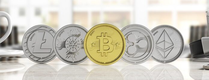 Cryptocurrency. Golden bitcoin and variety of silver virtual coins on blur background, banner, front view. 3d illustration