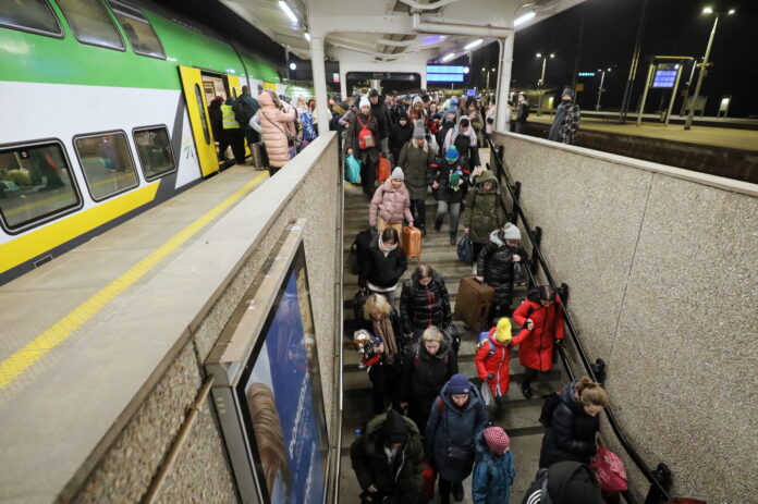 Ukrainian refugees arrive at Warsaw East train station