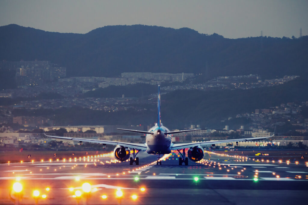 big plane landing during blue hour thumbnail