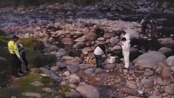 cabeza río Yanuncay Cabeza hallada río Yanuncay