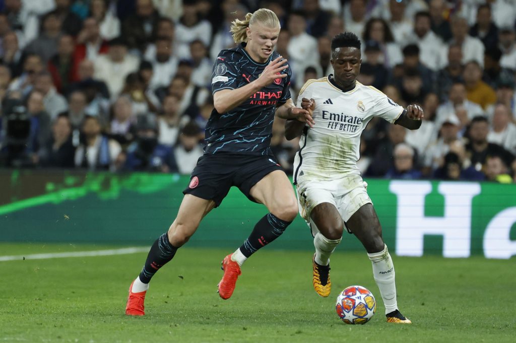 Haaland y Vinicius en el partido entre City y Real Madrid. Foto: EFE