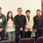 Participantes, finalistas y directivos de la Universidad Politécnica Salesiana en la proyección de cortometrajes en el campus El Girón.
