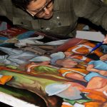 Jonathan Yubi Gómez, pintor nacido en EE.UU, de padres migrantes ecuatorianos, hace historia en las temáticas sociales de sus obras. Fotos: Jonathan Yubi Gómez. /Cortesía