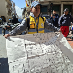 Un grupo de ‘vigilantes seguros’ de carros protagonizaron una marcha en el centro de Cuenca. /JIP