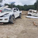 Vehículos atrapados por el aluvión